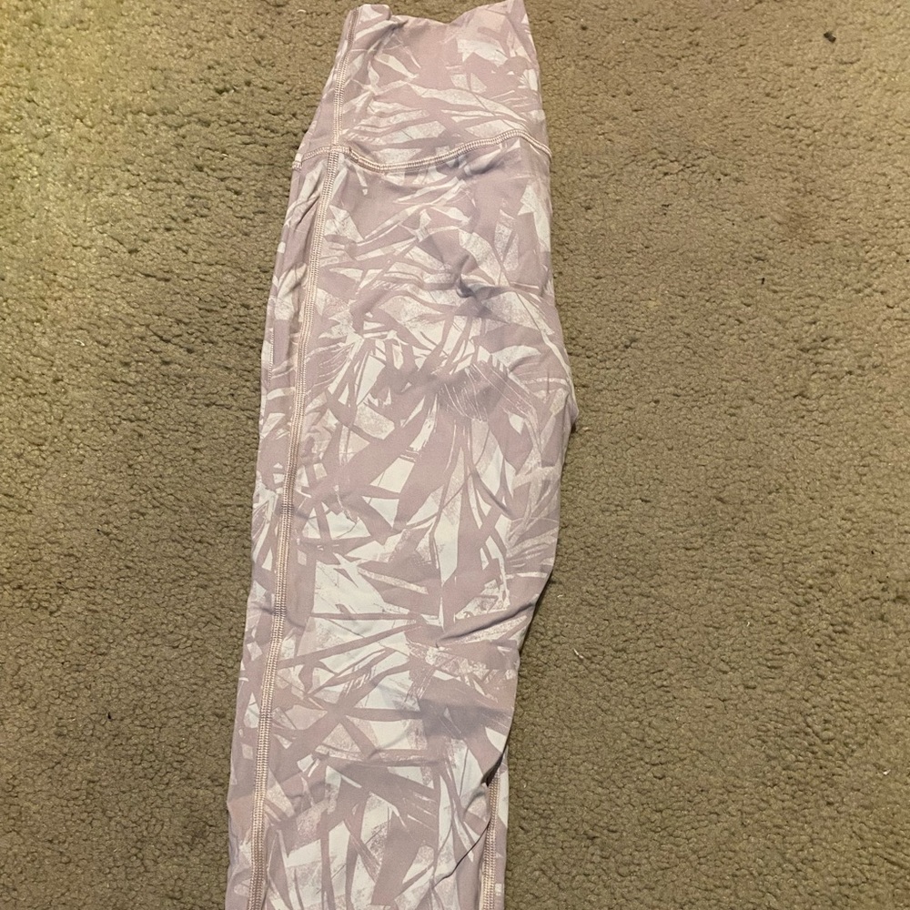 Pink patterned lululemon wunder under leggings